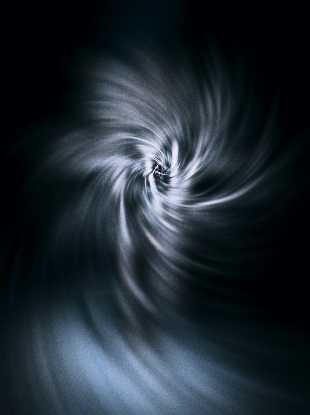 a-black-and-white-photo-of-a-swirl-s0g1yuq8lgm